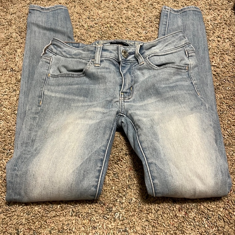 Has one little bleach stain very small back of the leg on the right side